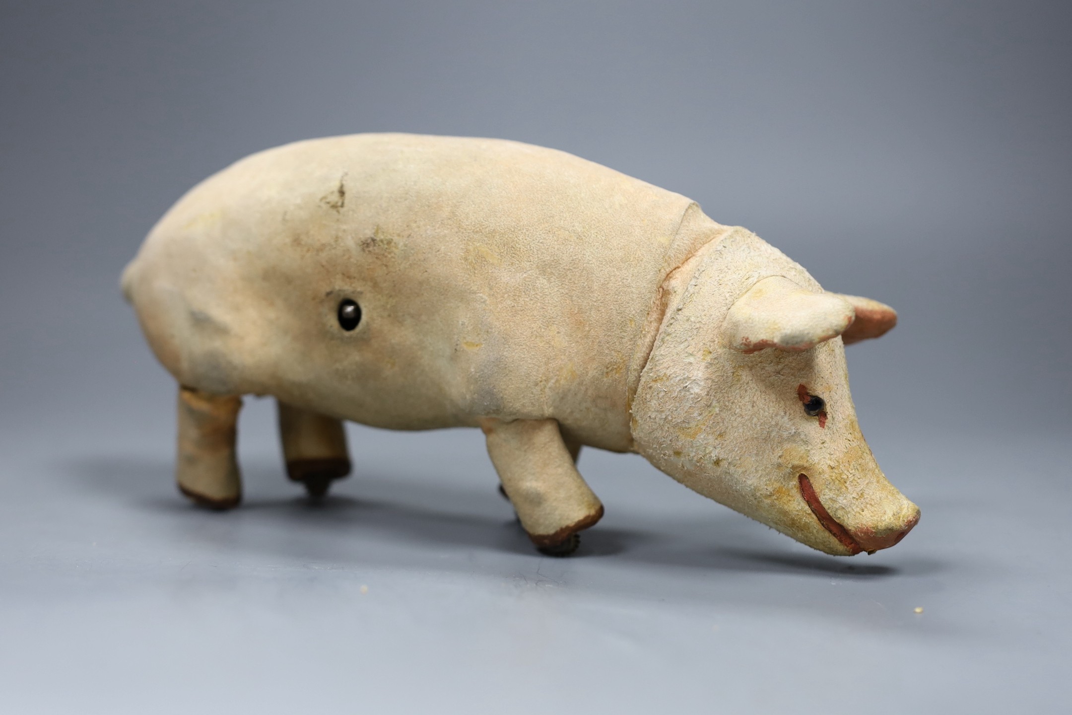 A Roullet & Decamps clockwork walking pig, 28cms long